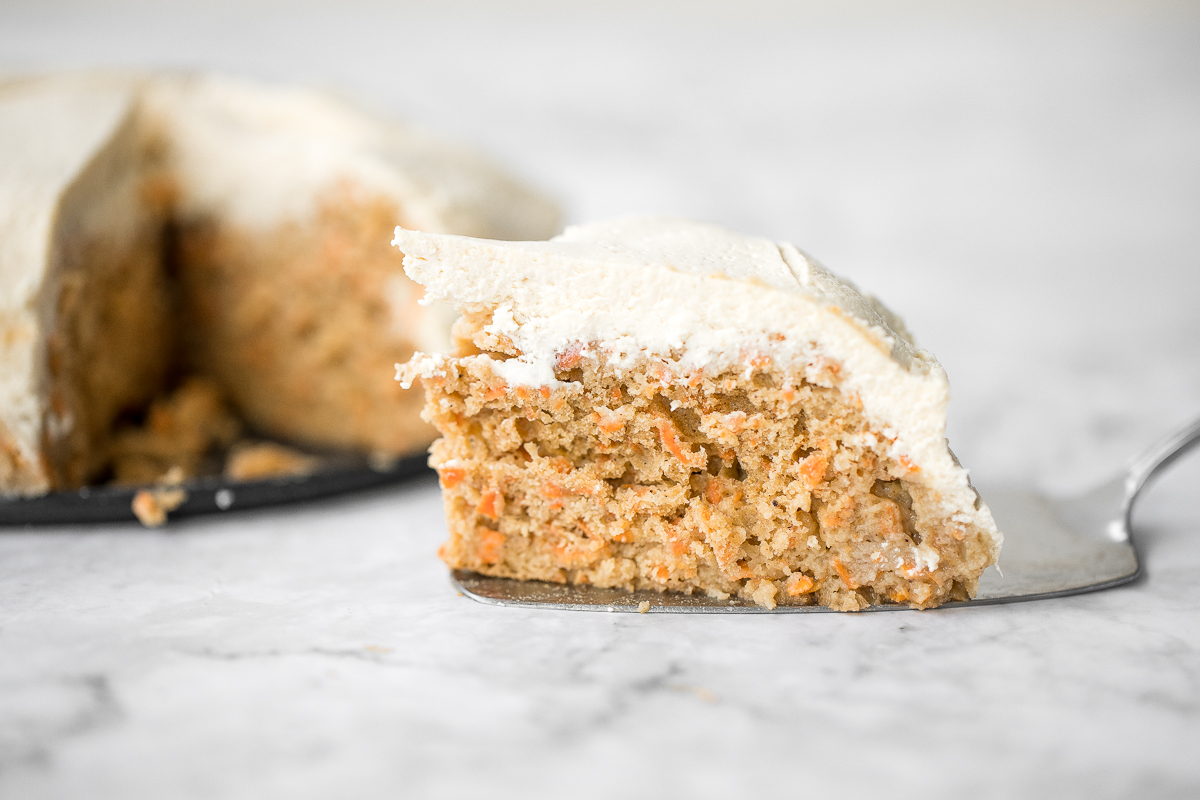 Super moist and perfectly spiced carrot cake with a creamy cheesecake topping is flavourful, comforting, and the perfect homemade spring dessert. | aheadofthyme.com