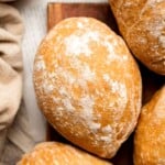 Easy small batch Ciabatta Rolls are fluffy and airy with a perfect crunchy, crackly crust. They take only 10 minutes to prepare and require no kneading. | aheadofthyme.com