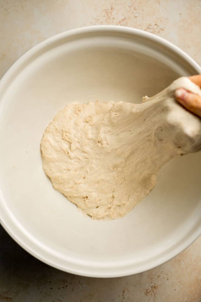 Easy small batch Ciabatta Rolls are fluffy and airy with a perfect crunchy, crackly crust. They take only 10 minutes to prepare and require no kneading. | aheadofthyme.com