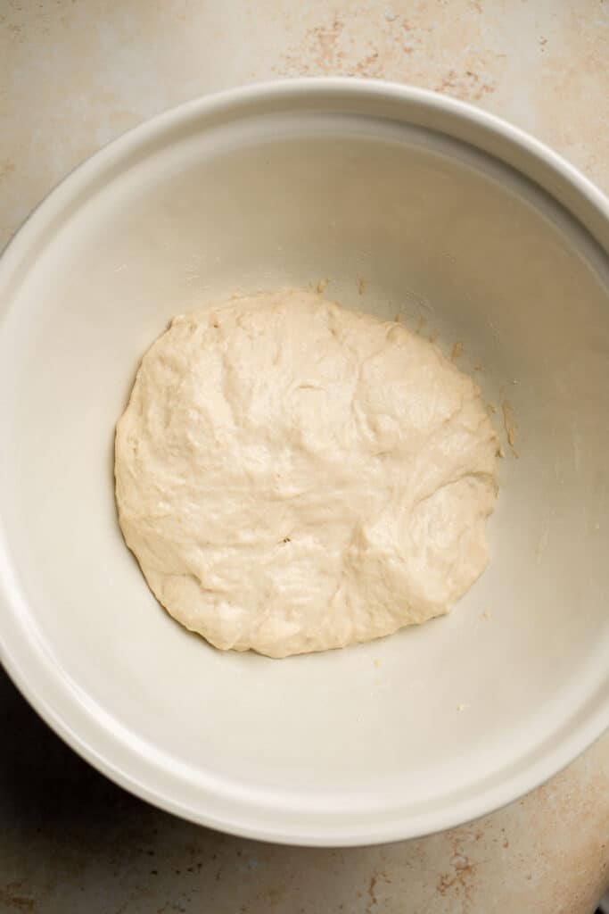 Easy small batch Ciabatta Rolls are fluffy and airy with a perfect crunchy, crackly crust. They take only 10 minutes to prepare and require no kneading. | aheadofthyme.com