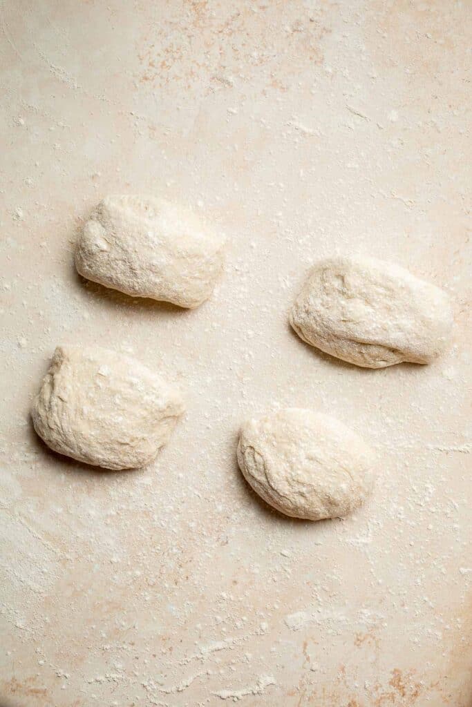 Easy small batch Ciabatta Rolls are fluffy and airy with a perfect crunchy, crackly crust. They take only 10 minutes to prepare and require no kneading. | aheadofthyme.com