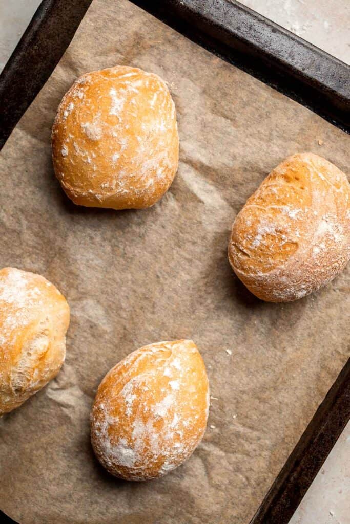 Easy small batch Ciabatta Rolls are fluffy and airy with a perfect crunchy, crackly crust. They take only 10 minutes to prepare and require no kneading. | aheadofthyme.com