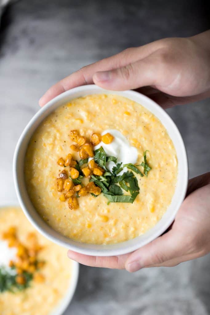 This vegetarian, hearty and filling, creamy Mexican corn soup is dense, bright, and full of flavour! It is the perfect Cinco de Mayo recipe. | aheadofthyme.com