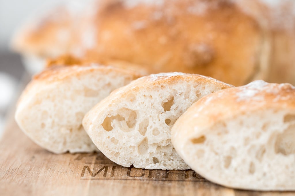 Easy small batch ciabatta rolls are fluffy and airy with a perfect crunchy, crackly crust. They take only 10 minutes to prepare and require no kneading. | aheadofthyme.com