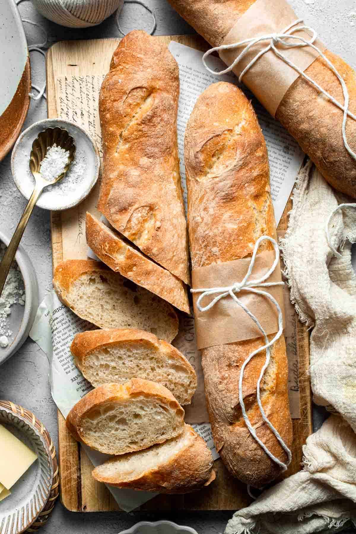 These homemade no knead French Baguettes are just what bread dreams are made of — beautifully golden loaves with a crisp crust and soft, airy interior. | aheadofthyme.com