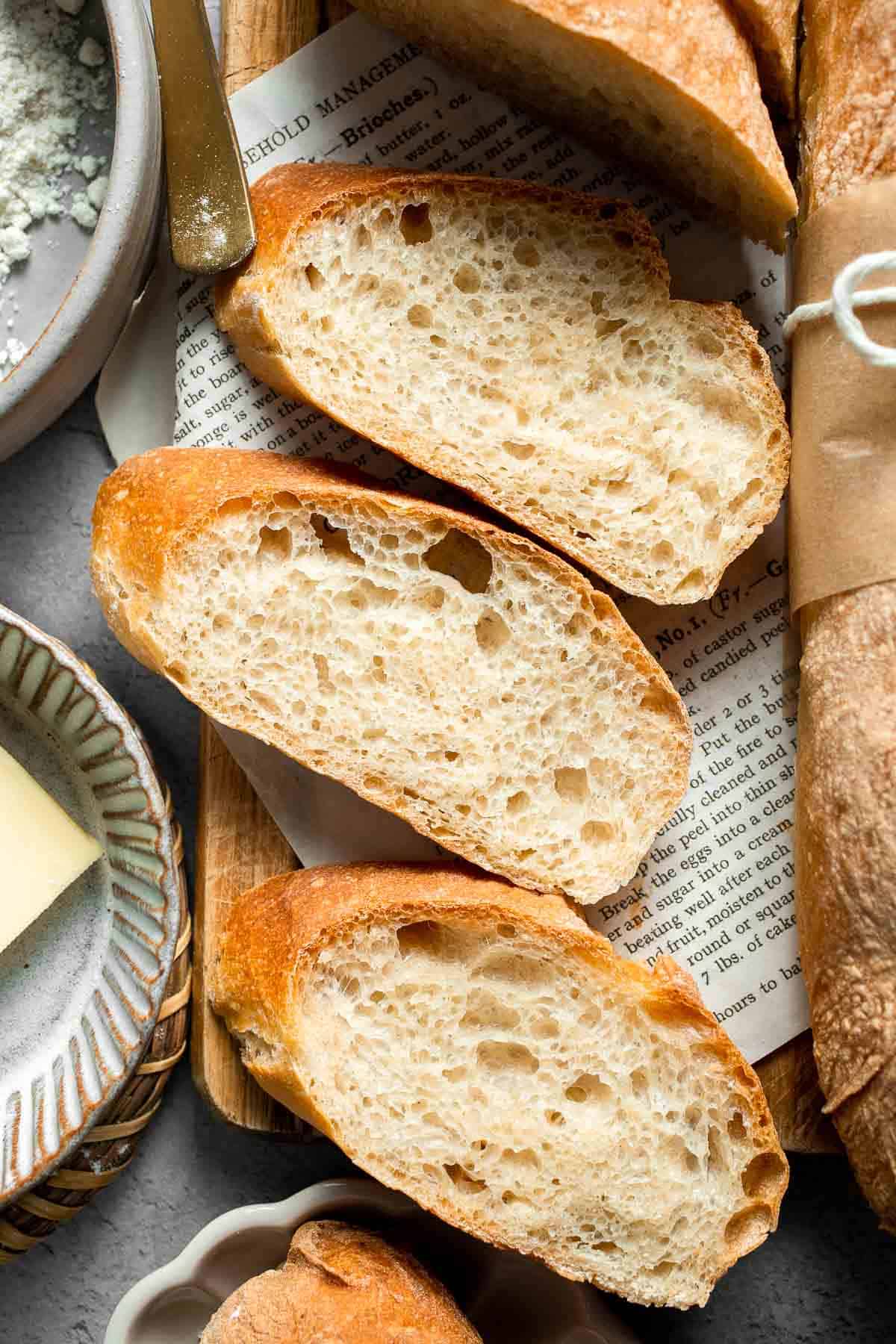 These homemade no knead French Baguettes are just what bread dreams are made of — beautifully golden loaves with a crisp crust and soft, airy interior. | aheadofthyme.com