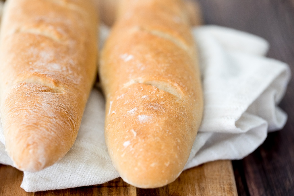 These homemade no knead French baguettes are just what bread dreams are made of -- light, tender and airy crumb inside, and a crispy, crunchy crust outside. | aheadofthyme.com