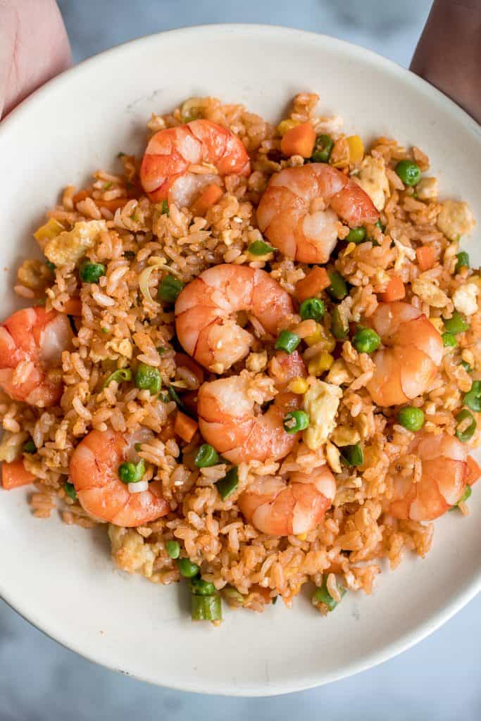 Quick and easy, one-pan, 10-minute seafood fried rice with tiger prawns is so much healthier, tastier and better than takeout. It's the easiest weeknight meal. | aheadofthyme.com