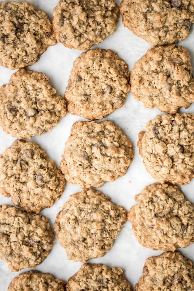 Grab a tall glass of milk and start dipping the best homemade, soft-centered, chewy chocolate chip oatmeal cookies you will ever try! | aheadofthyme.com