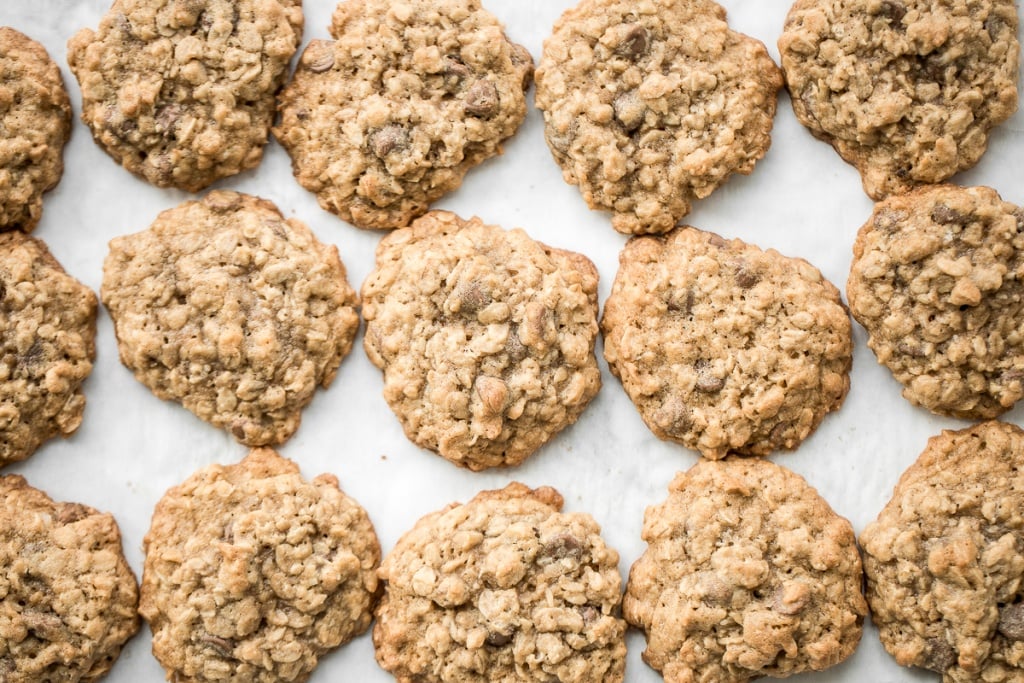 Grab a tall glass of milk and start dipping the best homemade, soft-centered, chewy chocolate chip oatmeal cookies you will ever try! | aheadofthyme.com