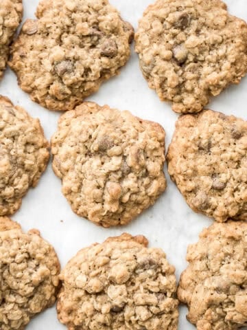 Grab a tall glass of milk and start dipping the best homemade, soft-centered, chewy chocolate chip oatmeal cookies you will ever try! | aheadofthyme.com