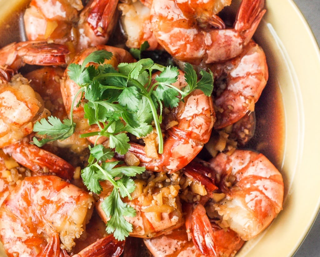 10-minute tiger prawns in garlic ginger soy sauce is juicy, tender and immersed in incredible Asian flavours. It's the perfect weeknight meal. | aheadofthyme.com