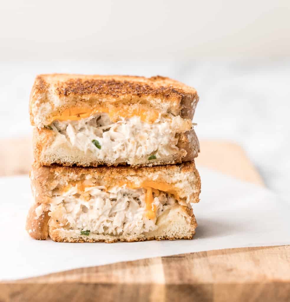 Get your hands on pantry staple canned tuna and make a delicious, crunchy tuna melt grilled cheese sandwich in less than 10 minutes! It's so tasty and easy! | aheadofthyme.com
