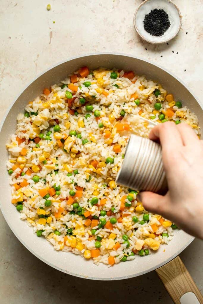 Say goodbye to takeout and make flavourful, Chinese restaurant-style vegetarian fried rice at home in 10 minutes, with fully customizable ingredients. | aheadofthyme.com