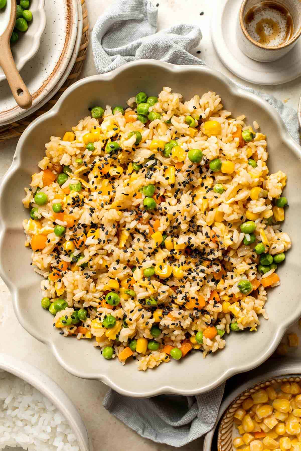 Say goodbye to takeout and make flavourful, Chinese restaurant-style vegetarian fried rice at home in 10 minutes, with fully customizable ingredients. | aheadofthyme.com
