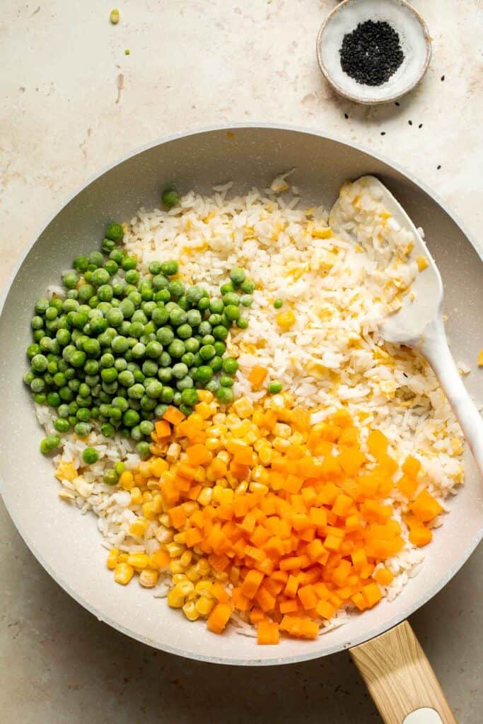 Say goodbye to takeout and make flavourful, Chinese restaurant-style vegetarian fried rice at home in 10 minutes, with fully customizable ingredients. | aheadofthyme.com