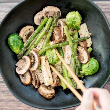 Simple air fryer spring vegetable "stir-fry" with tofu is the ultimate easy dinner ready in less than 10 minutes. It's healthy, vegan and gluten-free. | aheadofthyme.com