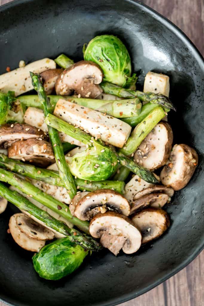 Simple air fryer spring vegetable "stir-fry" with tofu is the ultimate easy dinner ready in less than 10 minutes. It's healthy, vegan and gluten-free. | aheadofthyme.com