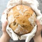 Artisan green olive sourdough bread is airy and chewy, has a signature crispy crust, and is loaded with tangy green olives for a Mediterranean flair. | aheadofthyme.com