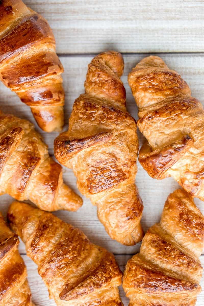 Quick and easy butter croissants are flaky, buttery, airy, and authentic, and are made in the fraction of the time using a special simplified technique. | aheadofthyme.com