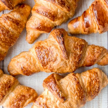 Quick and easy butter croissants are flaky, buttery, airy, and authentic, and are made in the fraction of the time using a special simplified technique. | aheadofthyme.com