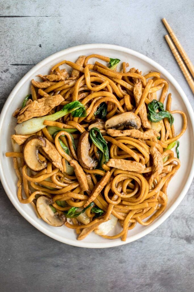 Better than take-out, flavourful and authentic Shanghai fried noodles with chicken, mushrooms, and bok choy is made in just 10 minutes - the easiest dinner! | aheadofthyme.com