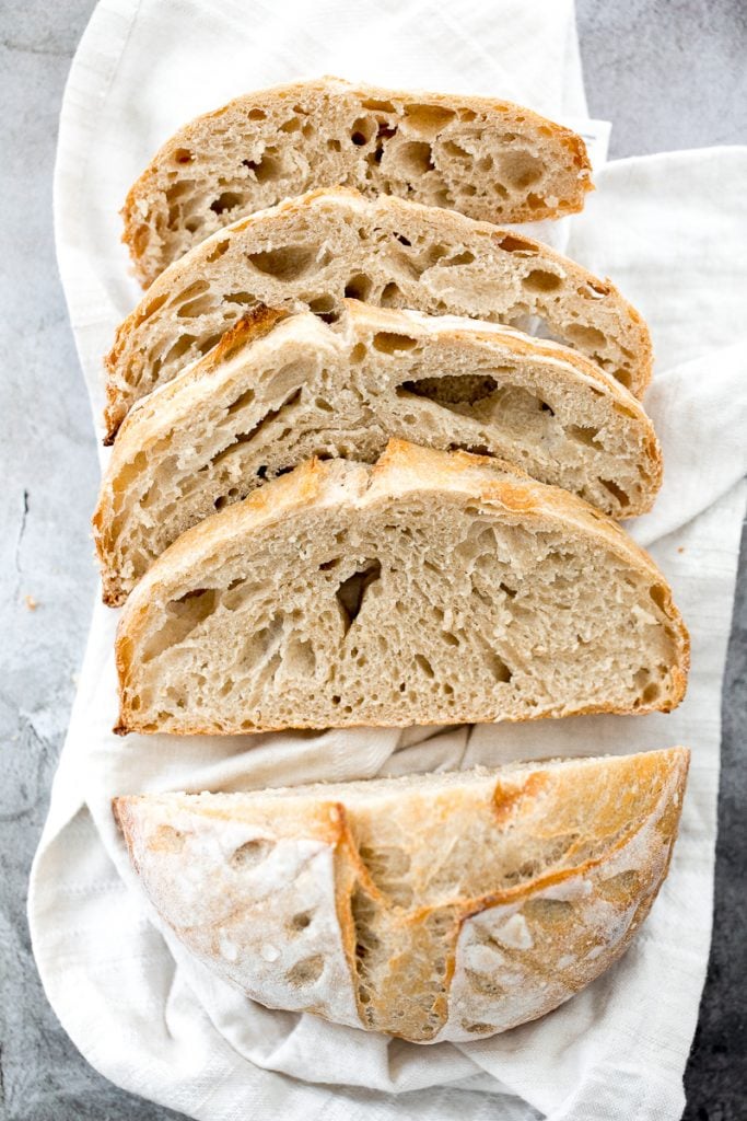 Small batch sourdough bread is airy and chewy with a crisp crust and a mild flavour. It takes less than 15 minutes of actual prep and requires no kneading. | aheadofthyme.com