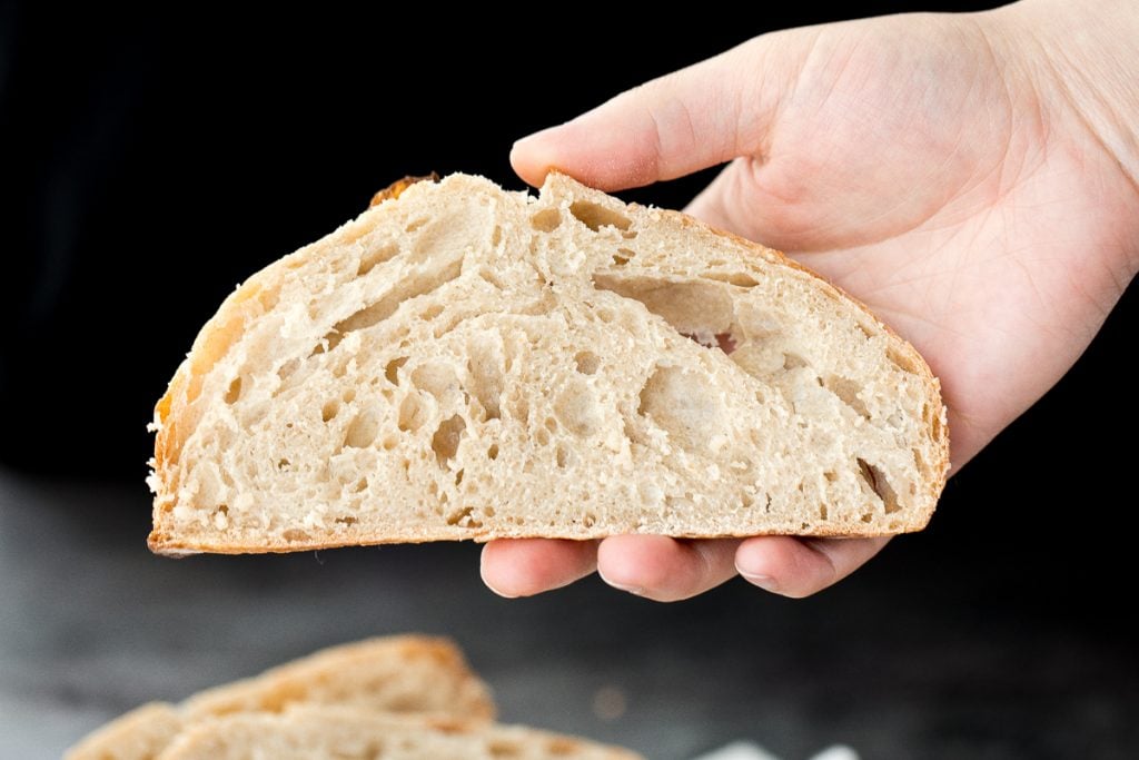 Small batch sourdough bread is airy and chewy with a crisp crust and a mild flavour. It takes less than 15 minutes of actual prep and requires no kneading. | aheadofthyme.com