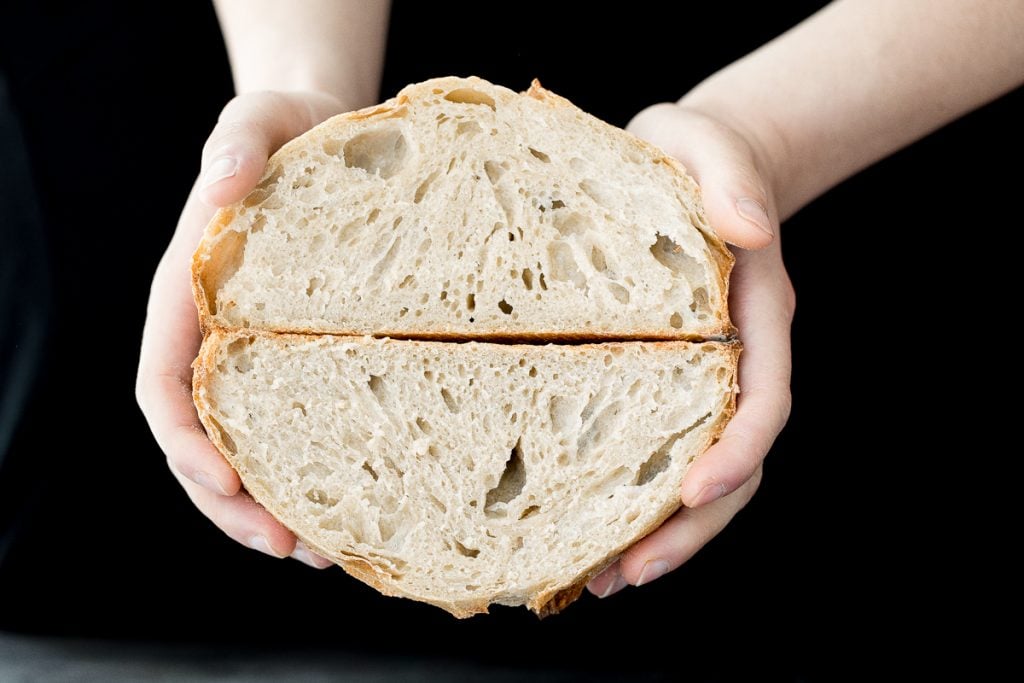 Small batch sourdough bread is airy and chewy with a crisp crust and a mild flavour. It takes less than 15 minutes of actual prep and requires no kneading. | aheadofthyme.com