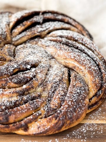 Soft and fluffy sourdough cinnamon roll twist bread is buttery and layered with cinnamon sugar. Prep it the night before and freshly bake it for breakfast. | aheadofthyme.com