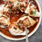 Easy spicy chili oil wontons, a signature Sichuan dish ready in just 10 minutes, hits every sense of your palate -- sour, spicy, sweet and nutty. | aheadofthyme.com