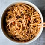 Toss thin wheat noodles in a spicy chili oil sauce and top with seasoned ground beef to make numbing, spicy Sichuan Dan Dan noodles in under 15 minutes. | aheadofthyme.com