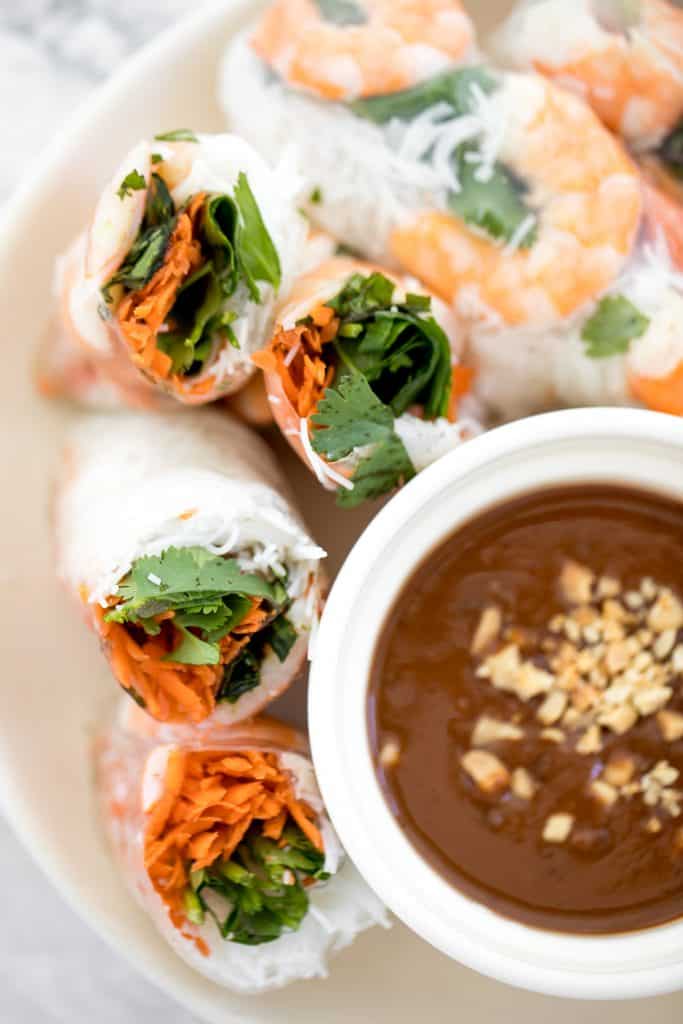 Fresh, light and healthy Vietnamese salad rolls are packed with vermicelli noodles, shrimp, fresh vegetables and herbs and dipped in homemade peanut sauce. | aheadofthyme.com