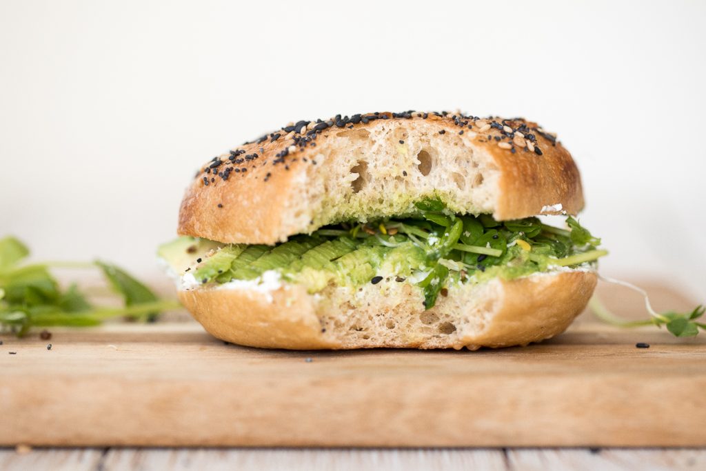 This simple and fully customizable avocado bagel with cream cheese is loaded with cream cheese, avocado, and microgreens. Such an easy breakfast or lunch! | aheadofthyme.com