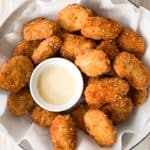 Easy homemade chicken nuggets with chicken breast are golden and crisp on the outside and juicy and tender inside. They're freezer-friendly so make extra. | aheadofthyme.com