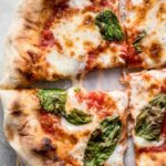 Quick and easy skillet Neapolitan margherita pizza has an iconic thin and soft crust with a perfectly crisp exterior, and simple and fresh toppings. | aheadofthyme.com