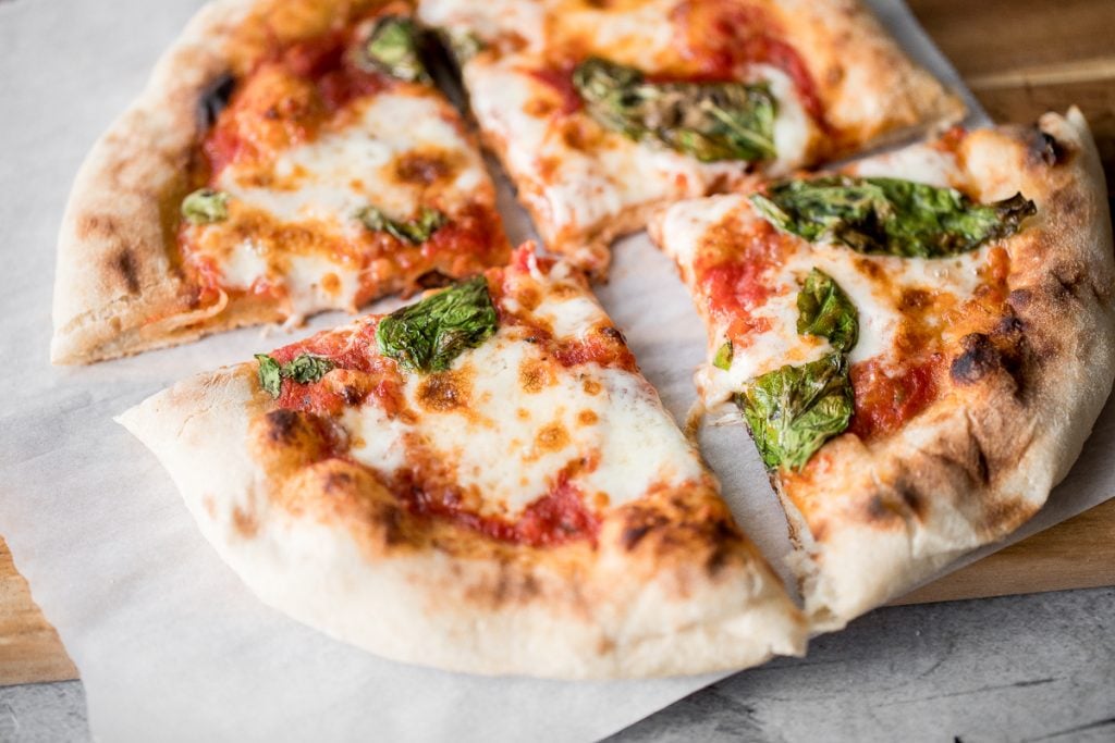 Quick and easy skillet Neapolitan margherita pizza has an iconic thin and soft crust with a perfectly crisp exterior, and simple and fresh toppings. | aheadofthyme.com