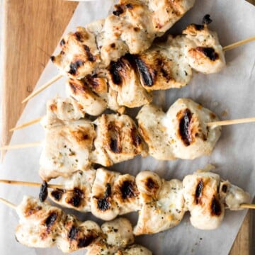Easy Greek Chicken Souvlaki Skewers are marinated in garlic, herbs, and lemon for that classic Mediterranean flavour. Grill in under 15 minutes! | aheadofthyme.com