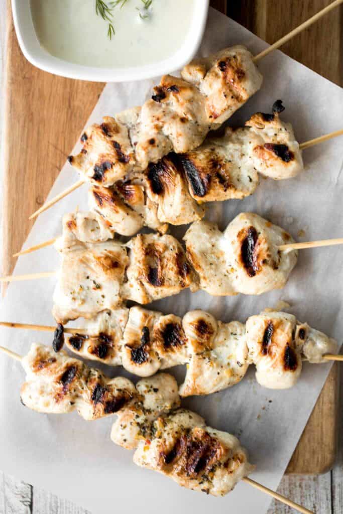 Easy Greek Chicken Souvlaki Skewers are marinated in garlic, herbs, and lemon for that classic Mediterranean flavour. Grill in under 15 minutes! | aheadofthyme.com
