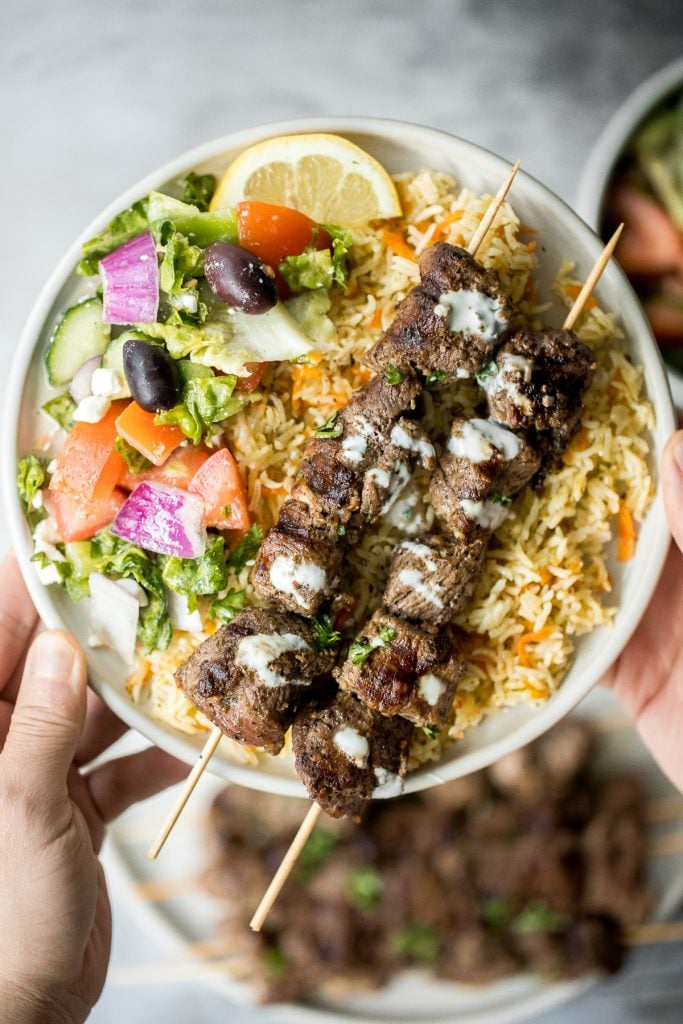 Quick and easy, grilled Greek lamb souvlaki skewers are marinated in a simple Mediterranean marinade for just 30 minutes. Serve with some tzatziki sauce. | aheadofthyme.com