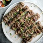 Quick and easy, grilled Greek lamb souvlaki skewers are marinated in a simple Mediterranean marinade for just 30 minutes. Serve with some tzatziki sauce. | aheadofthyme.com