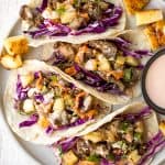 Fusion-style Korean beef steak tacos are made with tender, flavour-packed slices of beef and topped with caramelized pineapple, kimchi, and spicy mayo. | aheadofthyme.com