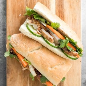 This easy-to-make, light and crunchy Vietnamese lemongrass chicken banh mi sandwich is packed with tender chicken, pickled vegetables and fresh herbs. | aheadofthyme.com