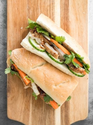 This easy-to-make, light and crunchy Vietnamese lemongrass chicken banh mi sandwich is packed with tender chicken, pickled vegetables and fresh herbs. | aheadofthyme.com