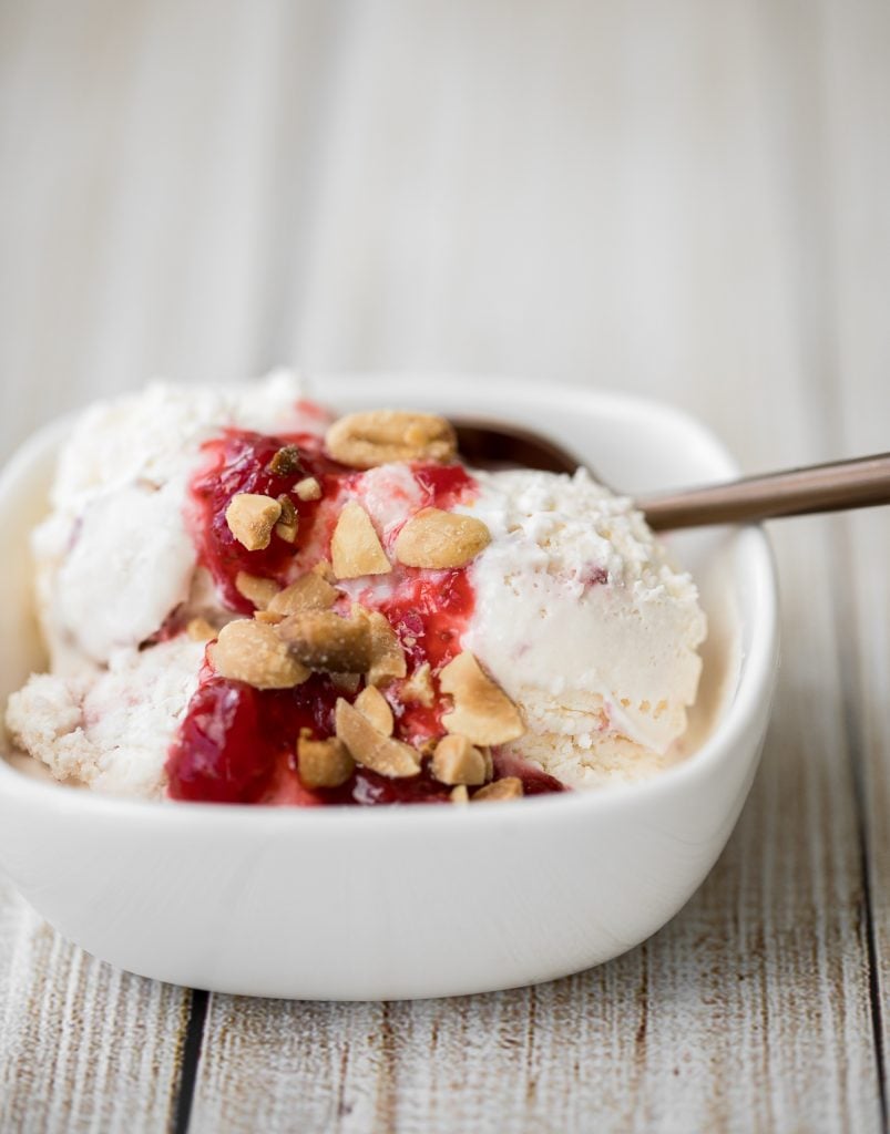 Smooth and creamy no churn vanilla ice cream with strawberry jam + toasted peanuts is easy to make, no ice cream maker required and better than storebought. | aheadofthyme.com