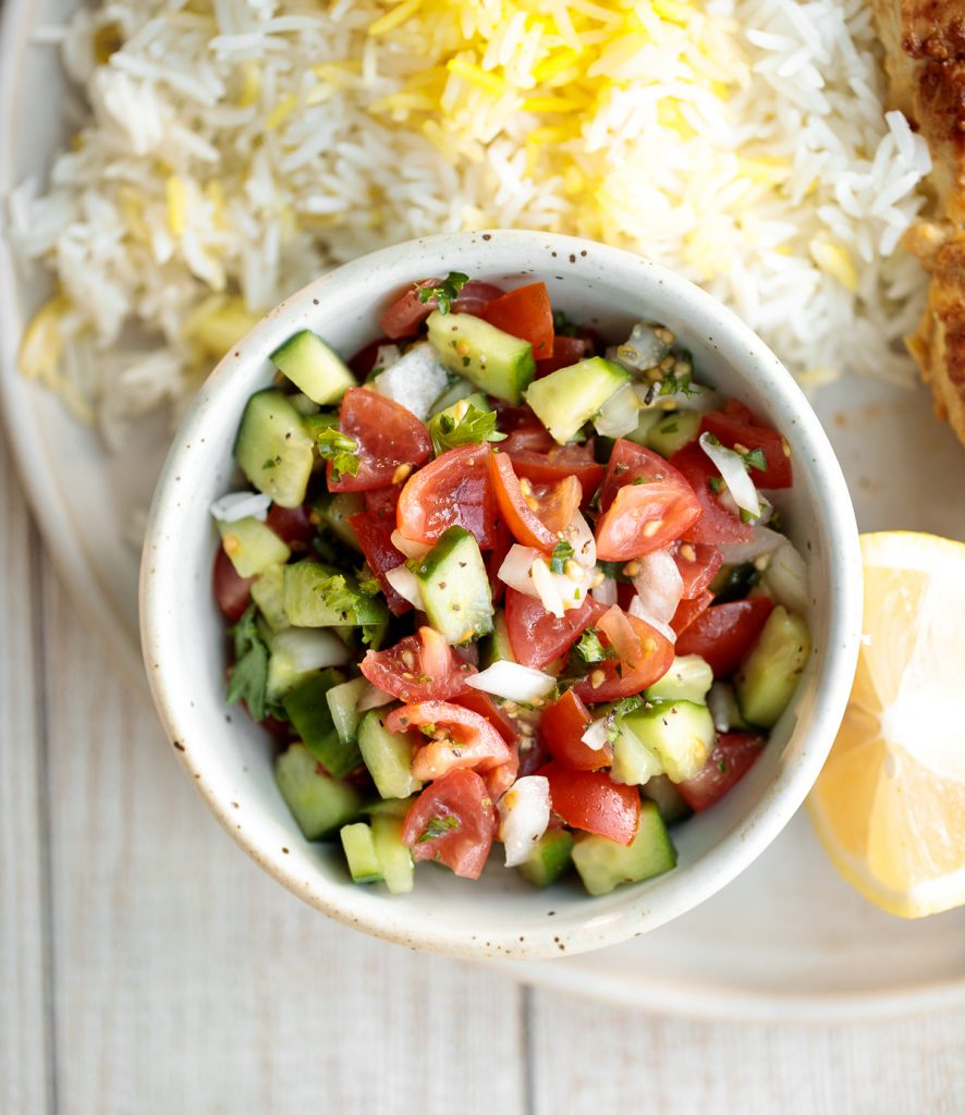 Healthy, light and refreshing Persian Shirazi salad with cucumber and tomato is a simple salad packed with herbs and tossed in an olive oil and lime dressing. | aheadofthyme.com