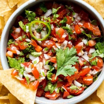 Homemade Pico de Gallo is quick and easy to make at home in just 5 minutes with a handful of simple ingredients. It's fresh, delicious, and authentic. | aheadofthyme.com