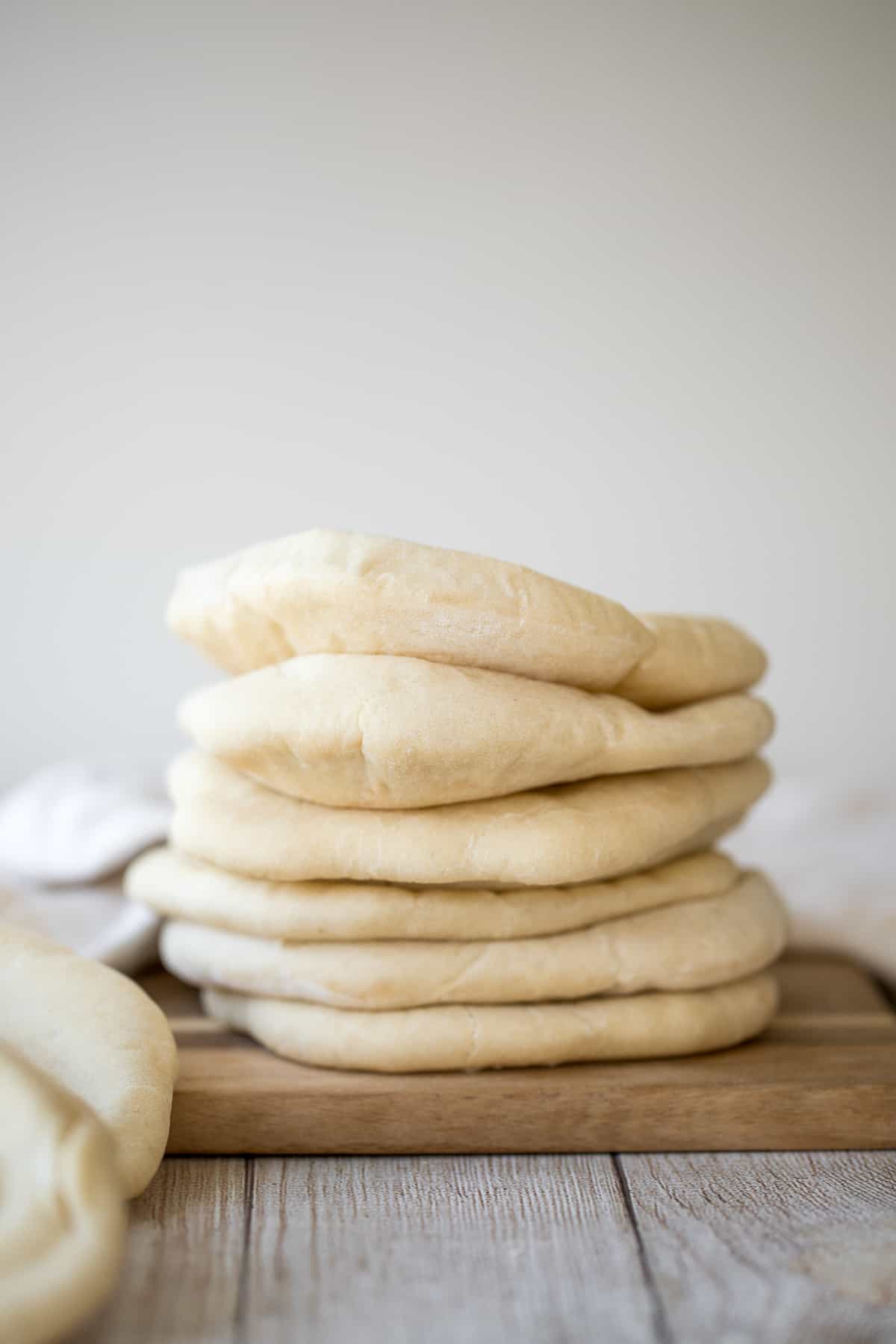 Nothing compares to freshly baked, quick and easy homemade pita bread. It's soft and puffy, with a perfect pocket. It takes just 15 minutes of actual prep. | aheadofthyme.com