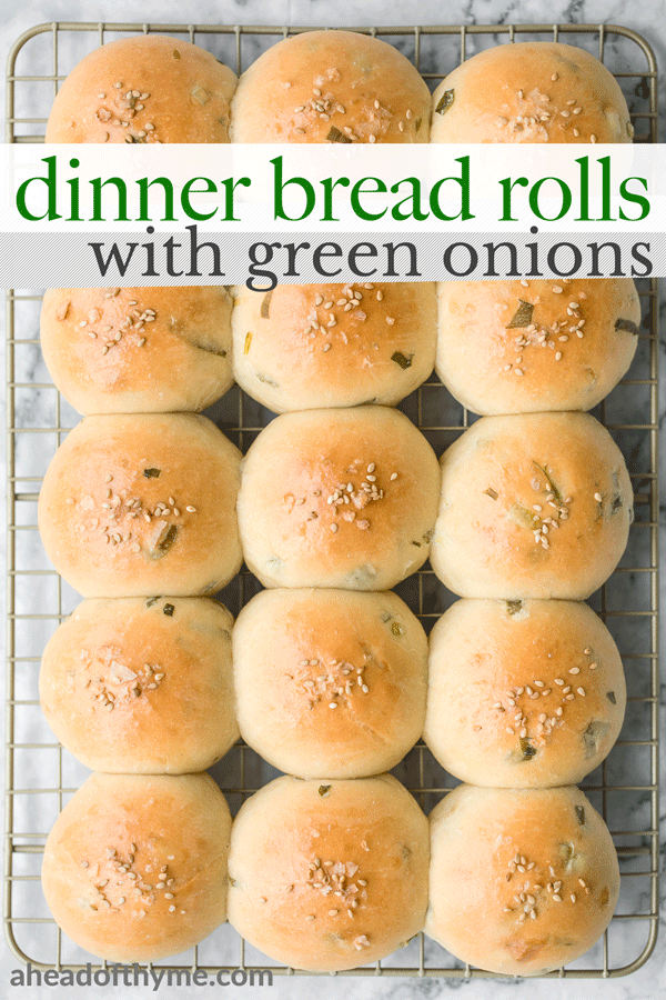 Soft and fluffy, quick dinner bread rolls are loaded with green onions and topped with flaked sea salt and sesame seeds. Ready in just 1.5 hours. | aheadofthyme.com