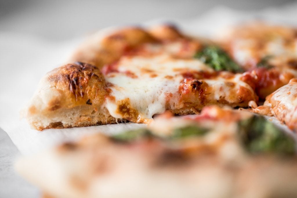 Use excess sourdough starter discard to make the best, easiest homemade small batch sourdough pizza dough to make an airy and chewy sourdough pizza crust. | aheadofthyme.com